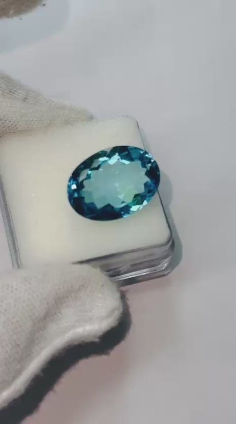 Load video: AAA 23.55 Carat Big Size Natural Swiss Blue Topaz Oval Cut Loose Gemstone