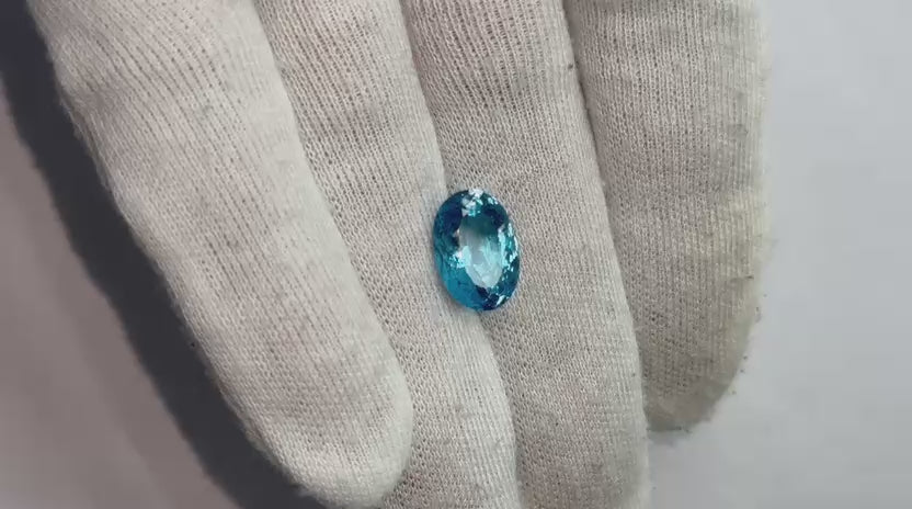 Load video: Natural London Blue Topaz Oval Lazer Cut Gemstone