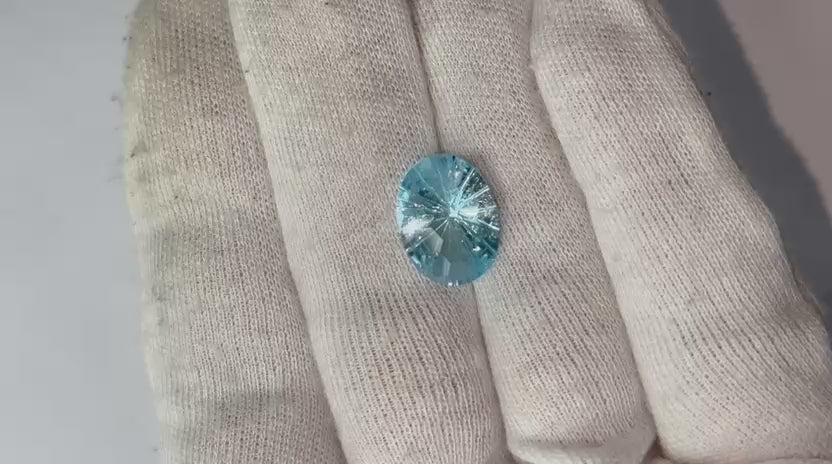 Load video: Natural Sky Blue Topaz Oval Football Laser Cut Loose Gemstone